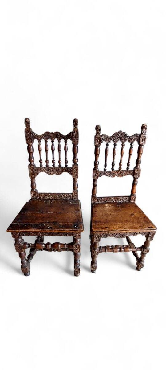 Rare pair of carved chairs, Italian manufacture from the 17th century