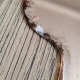 Mirror facing beveled hand