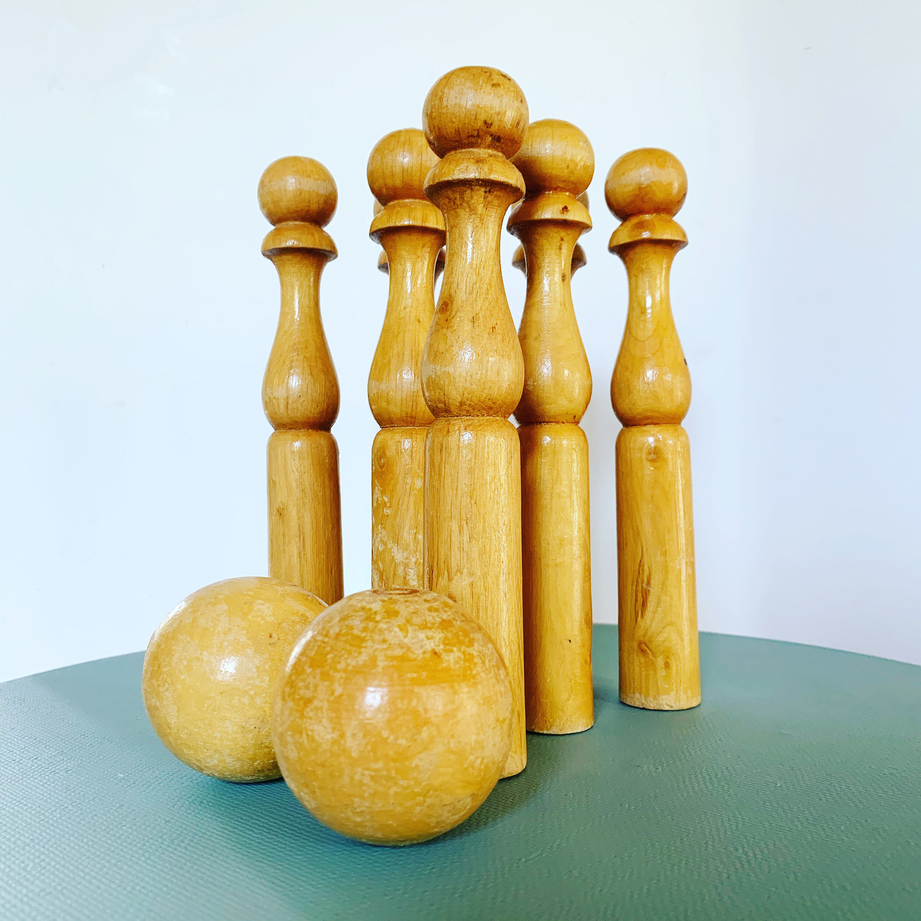 Set of 7 vintage wooden skittles and two balls