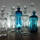 Holmegaard "Klukflasker", Set of 7 Mouth Blown Cluck Bottles or Decanters