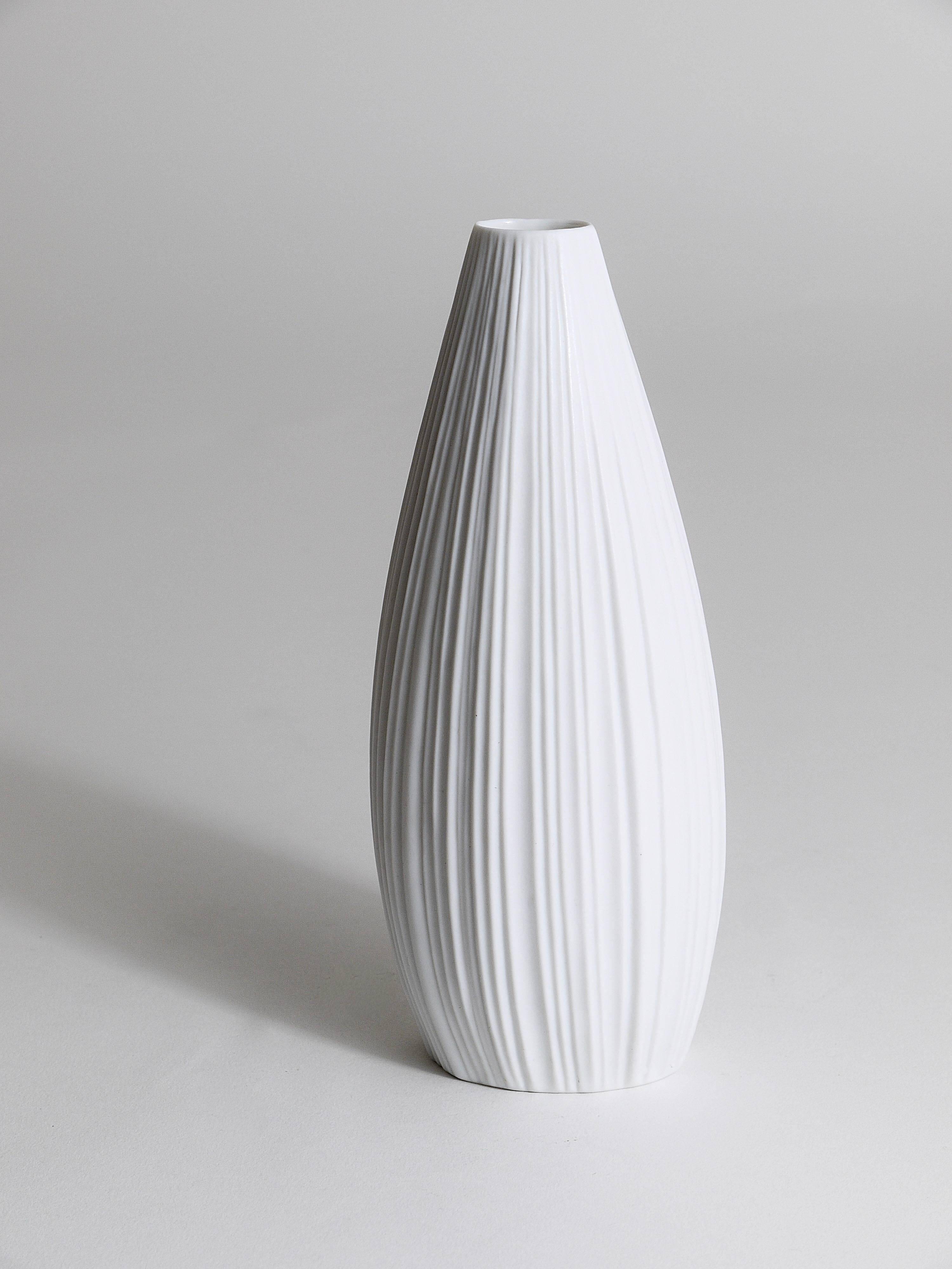 White porcelain vase with striped relief by Rosenthal, designed by Martin Freyer, Germany, 1960s.