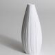 White porcelain vase with striped relief by Rosenthal, designed by Martin Freyer, Germany, 1960s.
