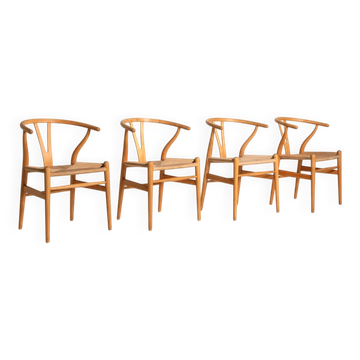 Set of four CH24 “Wishbone Chairs” by Hans J. Wegner, design 1950