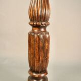 Large decorative column in richly carved wood
