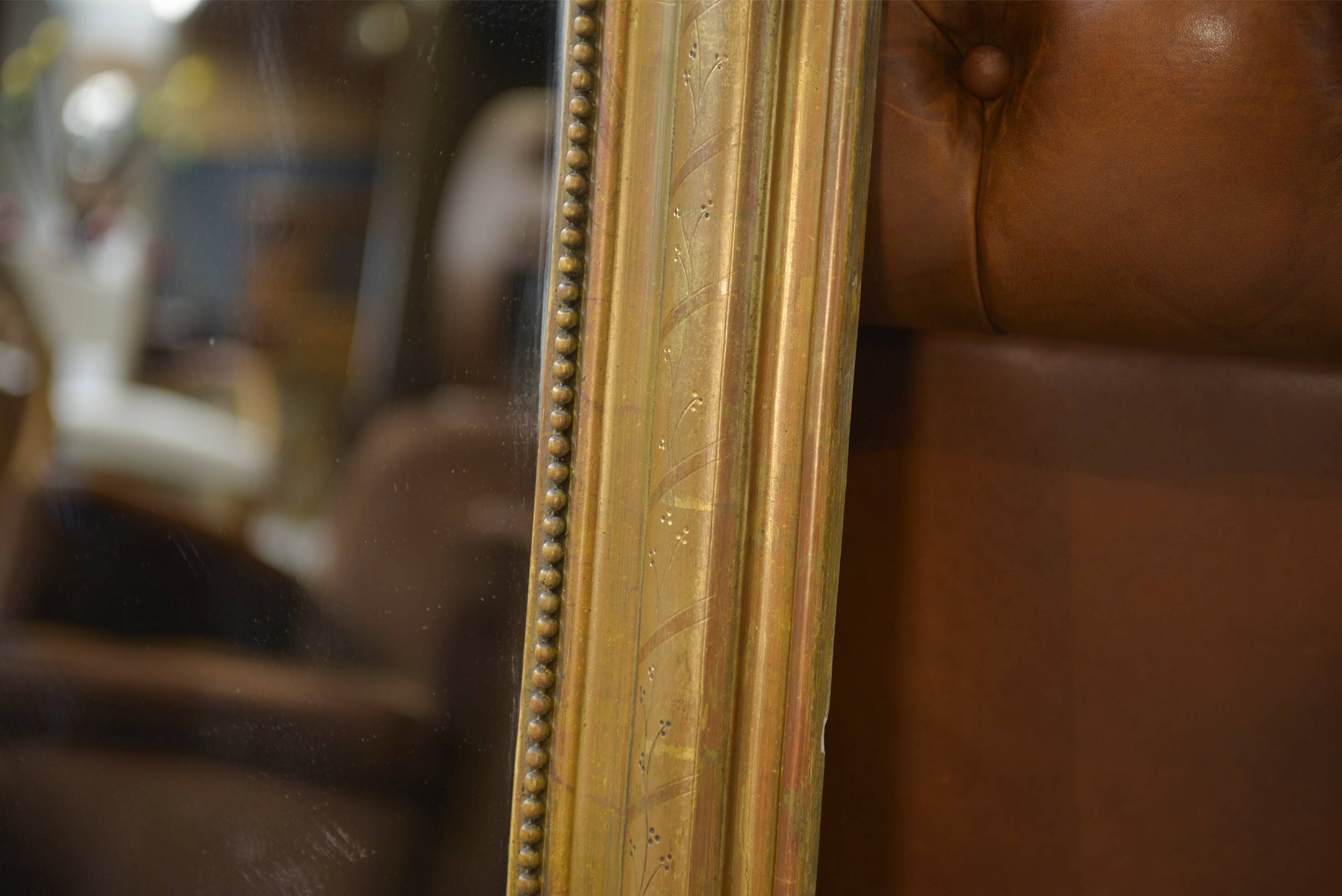 Mercury mirror from the Louis Philippe period, gilded with gold leaf, 19th century.