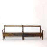 Handcrafted wooden bench with armrest and left drawer.