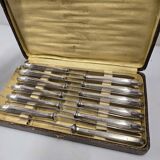 12 silver-plated knives from the mid-20th century
