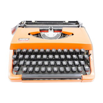 Machine à écrire brother 210 orange révisée avec ruban neuf