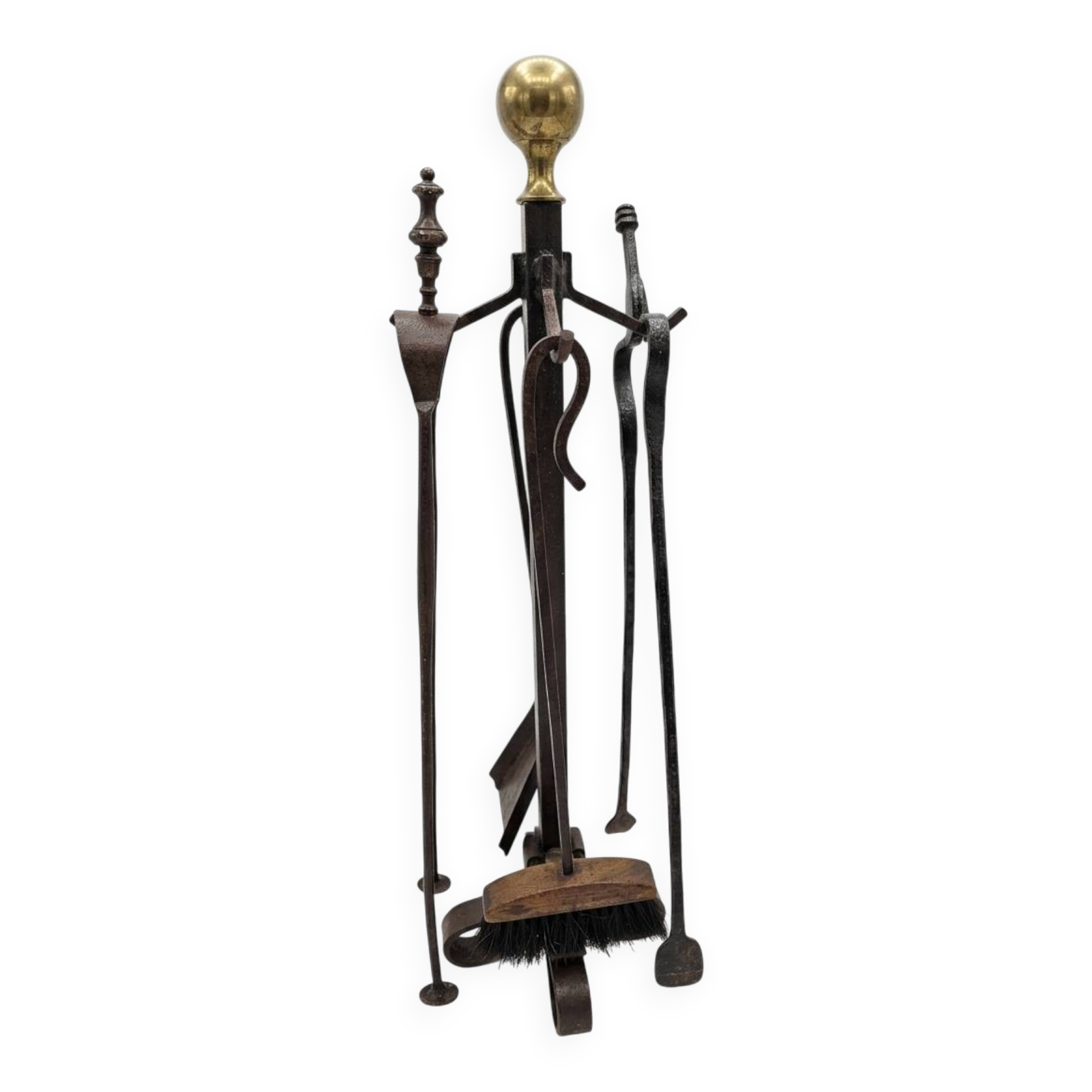 Antique fireplace set in solid wrought iron and brass.