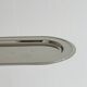 Small antique tray made of lightweight metal.