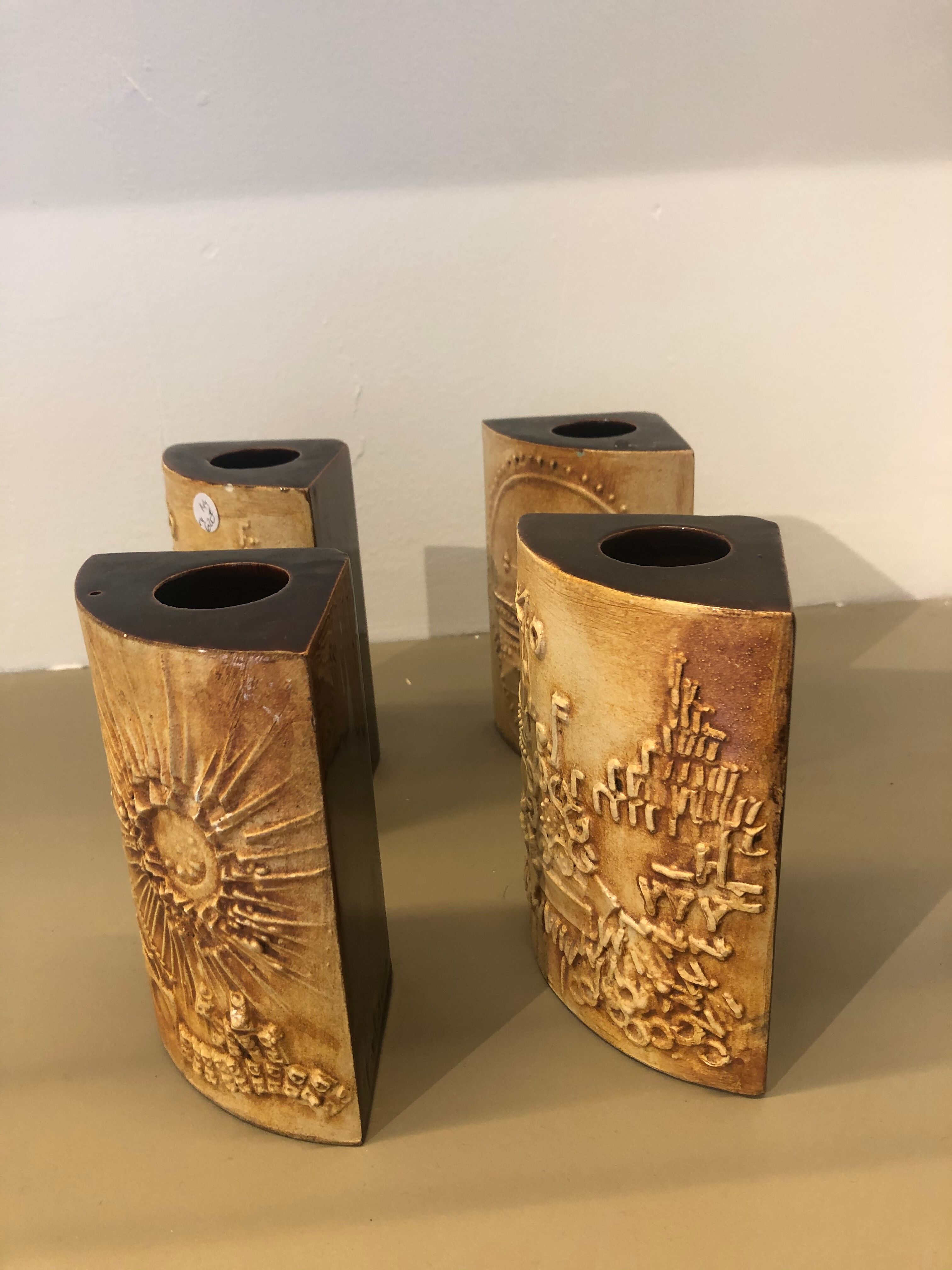 Series of four ceramic vases