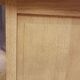 Old 2-door chest of drawers in air-coated oak, to be painted or varnished.