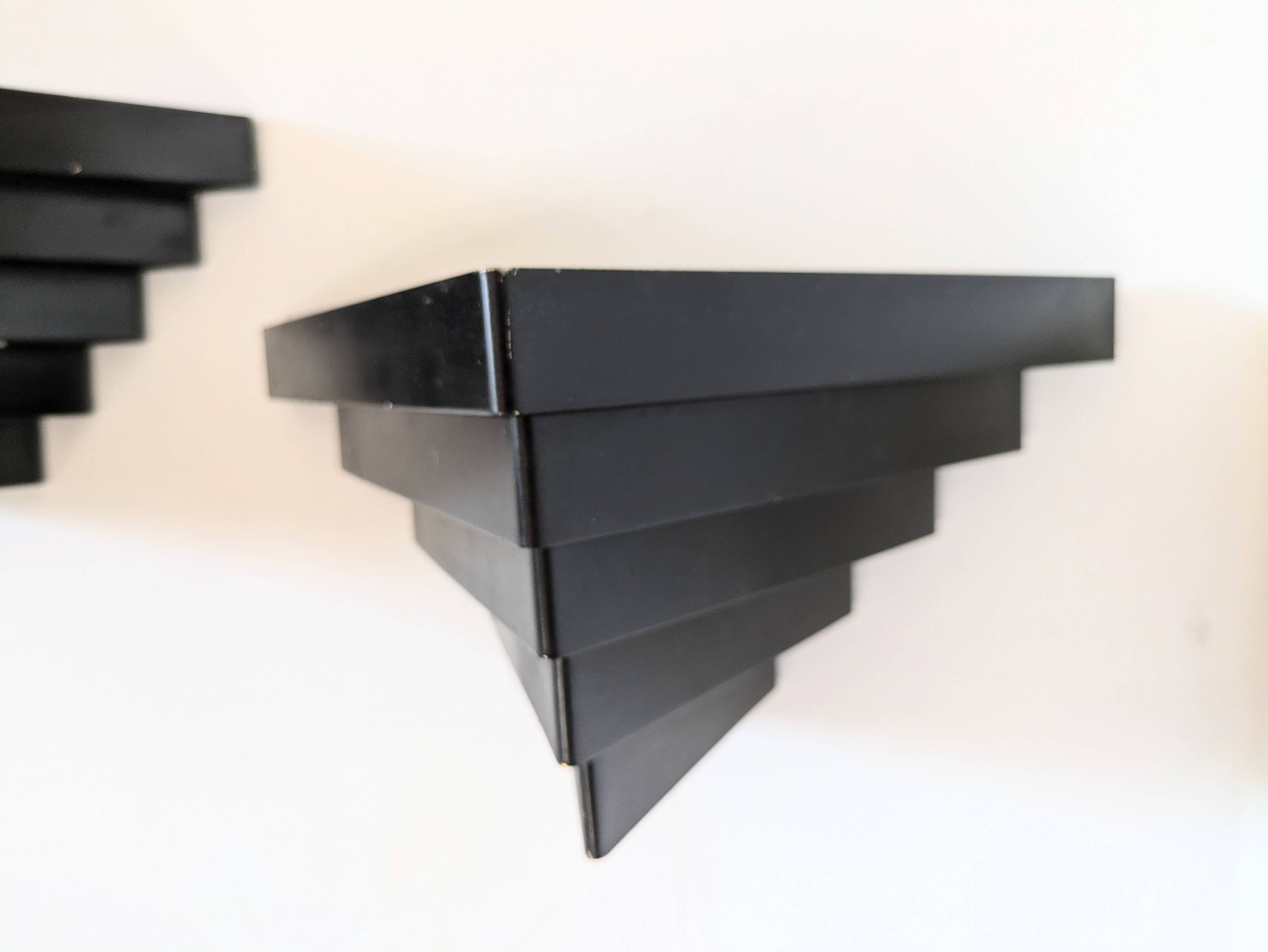 Pair of 1960s wall lights in perforated metal in the style of Mategot