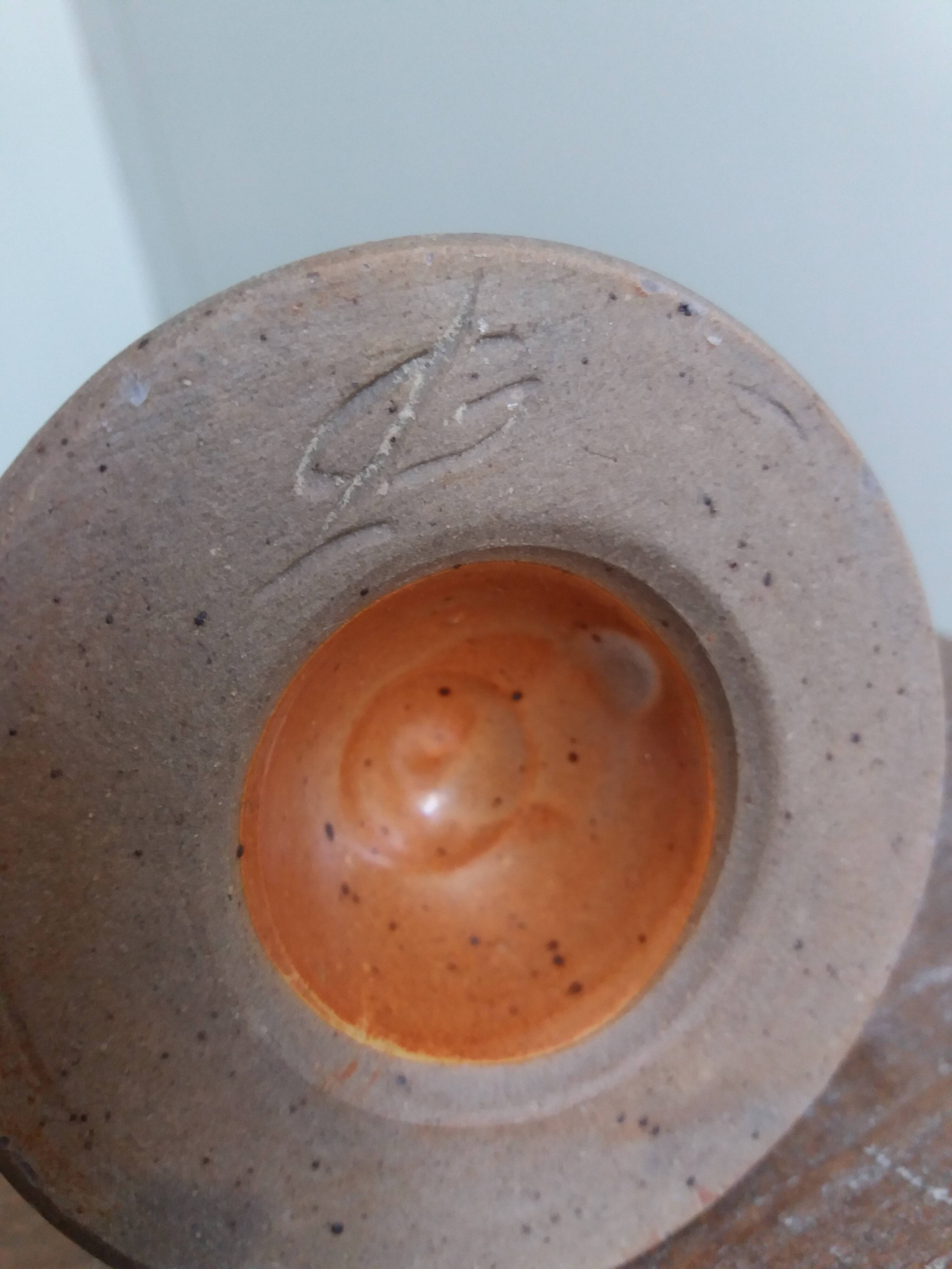 Anthropomorphic sandstone egg cup signed GL