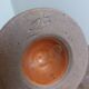 Anthropomorphic sandstone egg cup signed GL