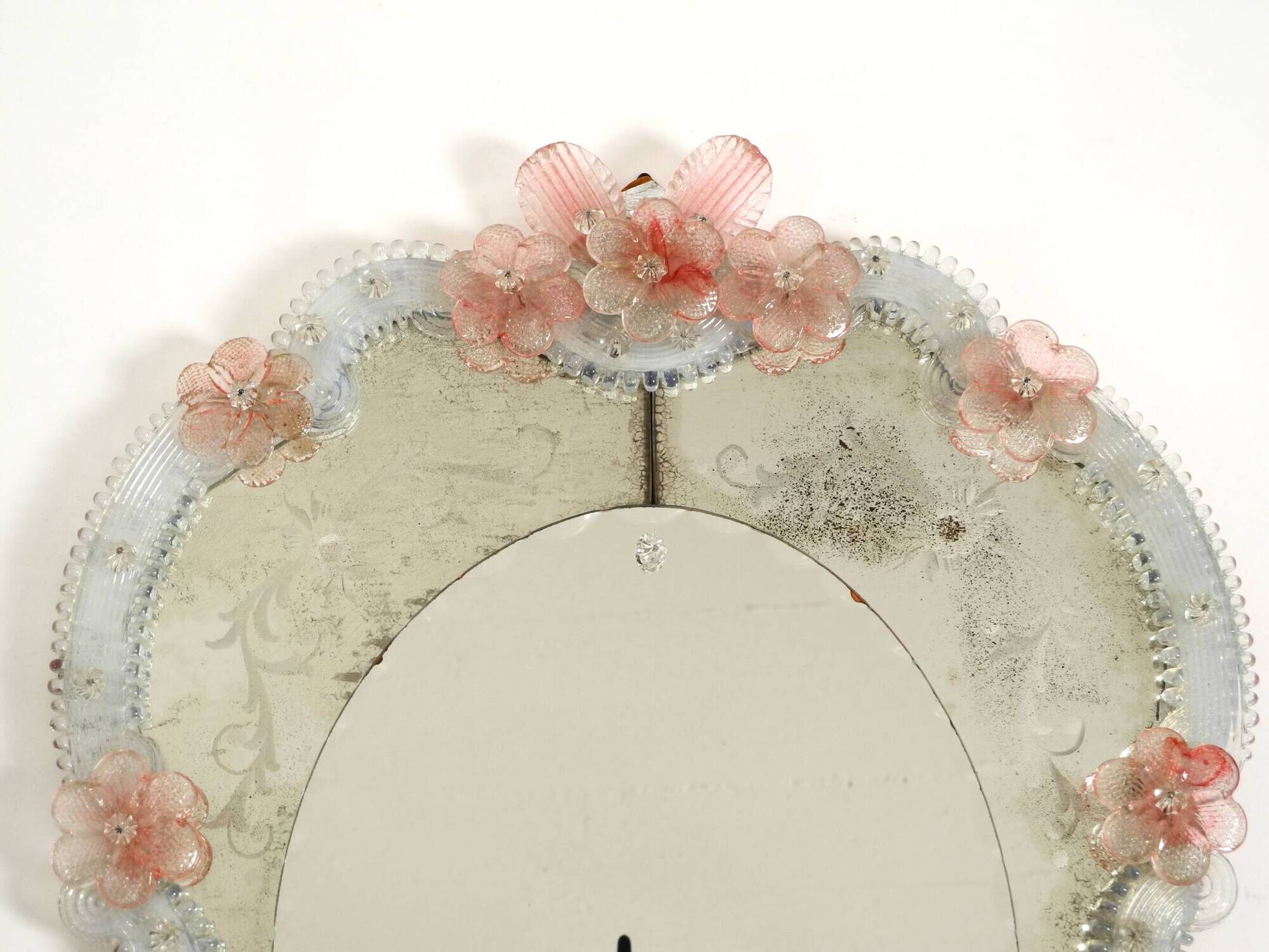 Italian mid-century wall mirror with a Murano glass frame and blossoms