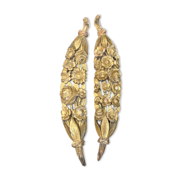 Pair of gilded wood decorated with floral garlands