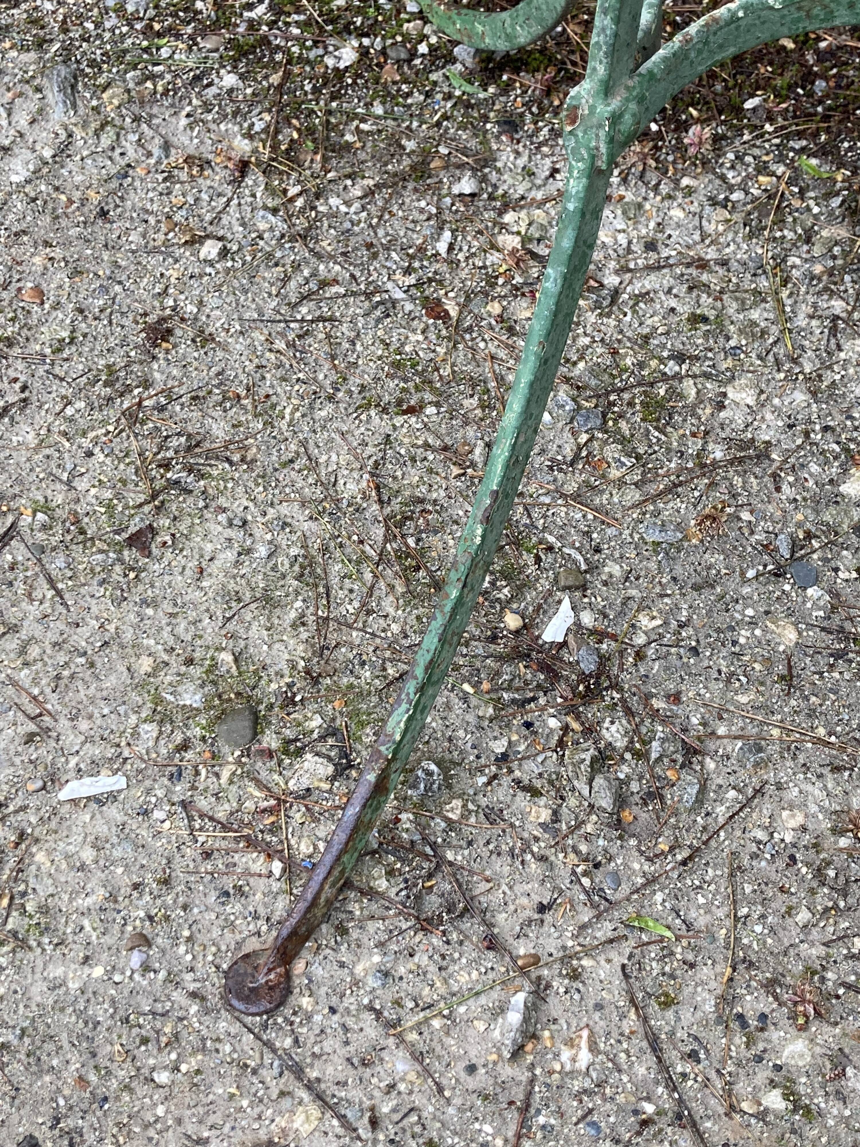 Riveted green old garden pedestal table