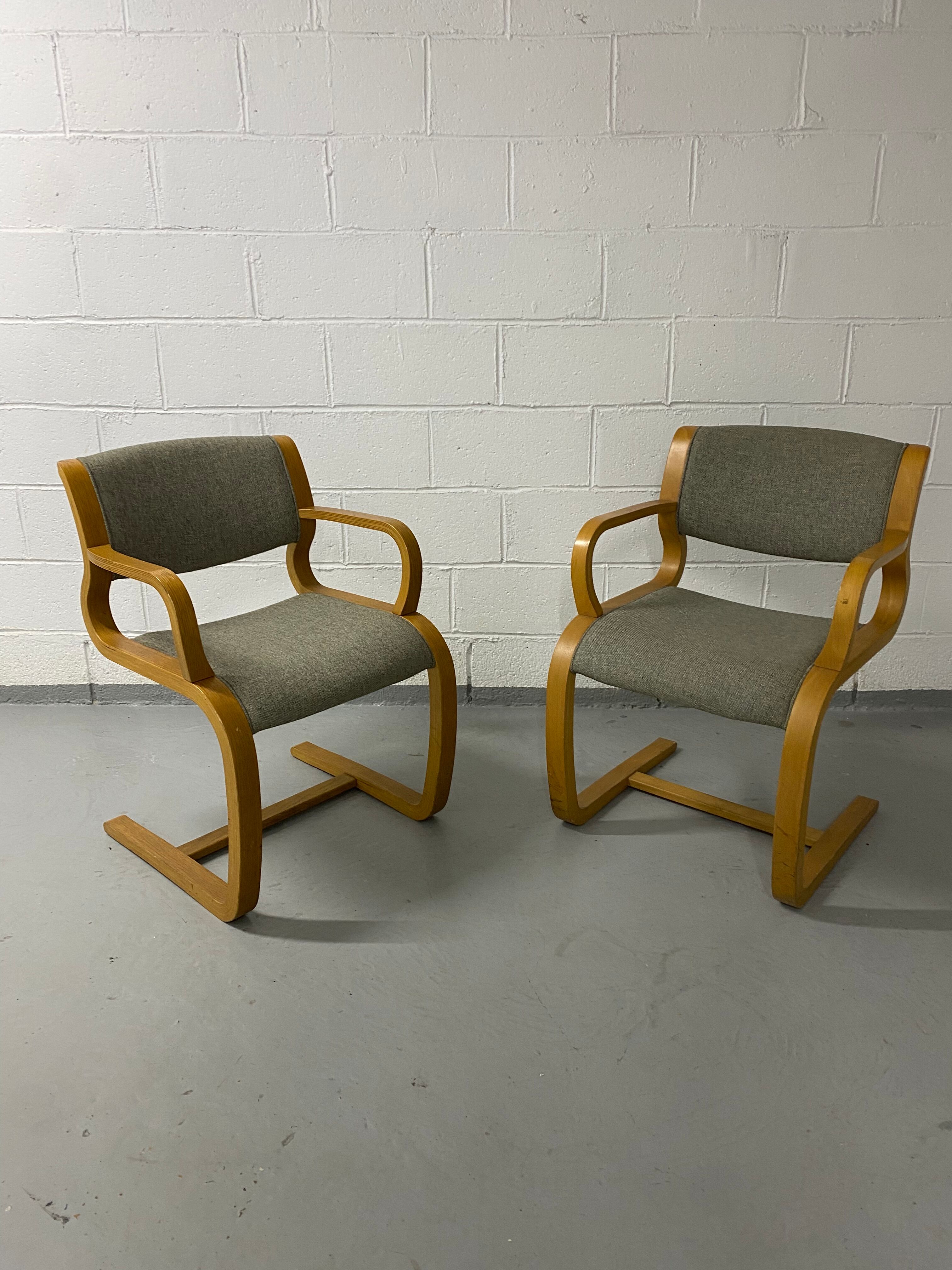 Pair of Danish armchairs, Canteliver model signed Magnus Olesen