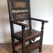 Set of an armchair and a pair of chairs in Italian Renaissance walnut