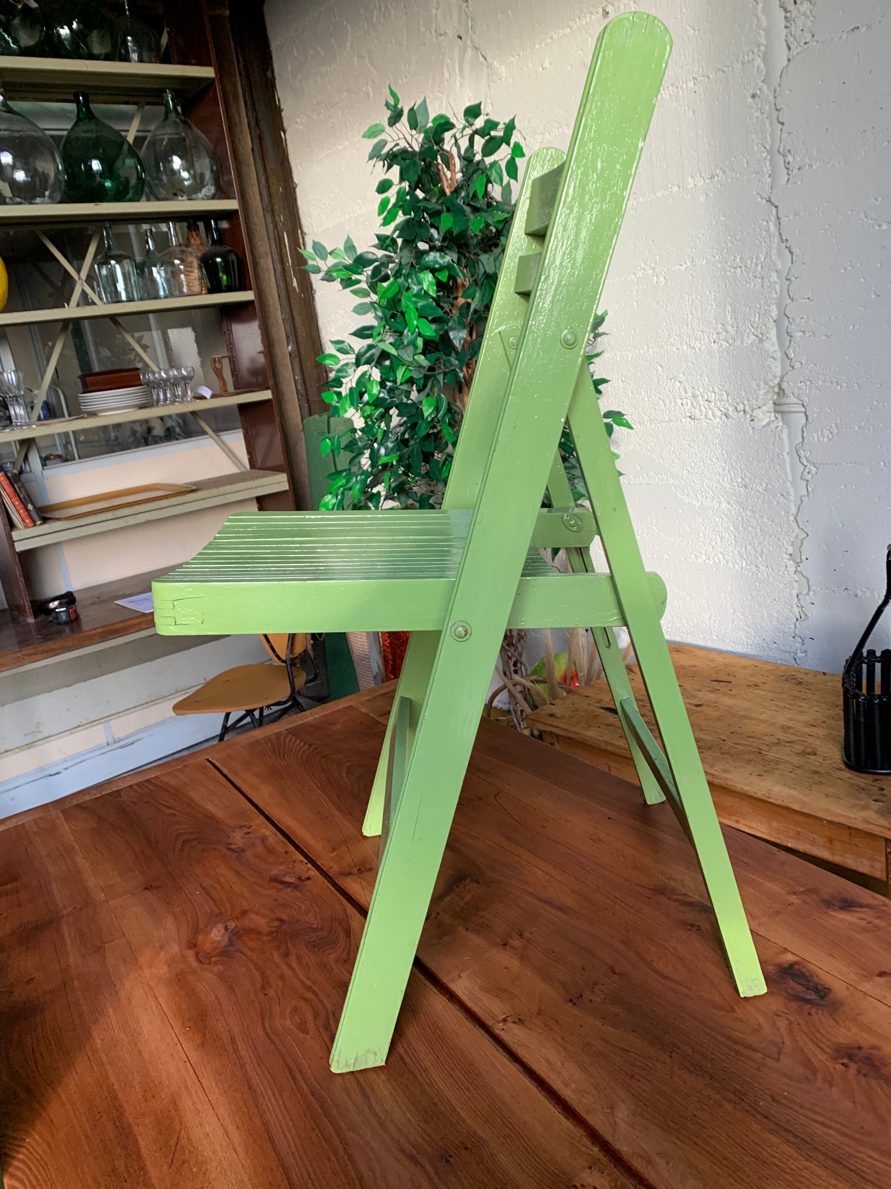 3 wooden folding chairs