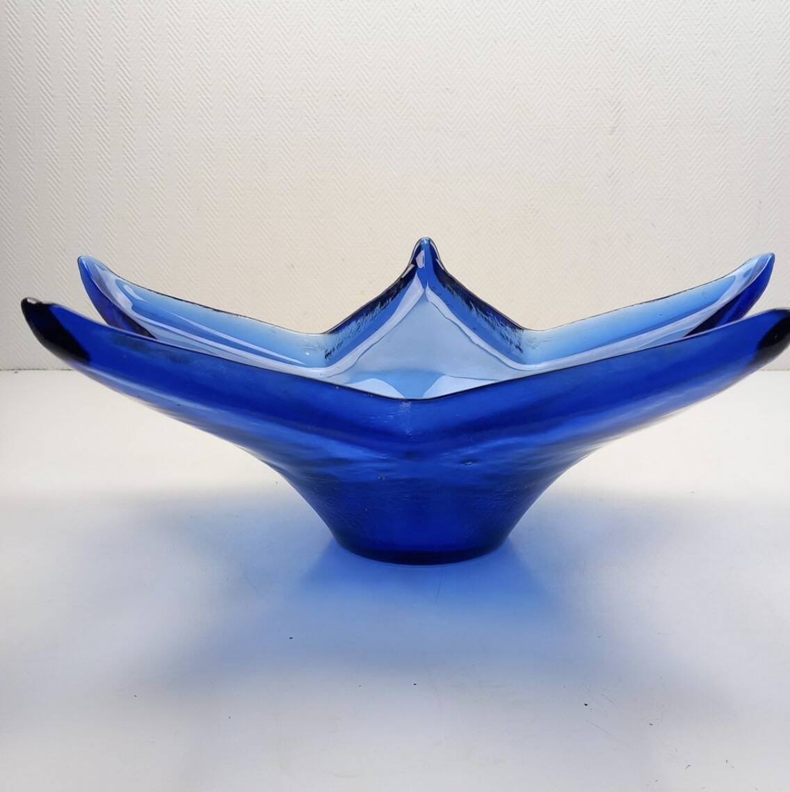 Vintage cobalt blue starfish-shaped fruit bowl in HSG style.