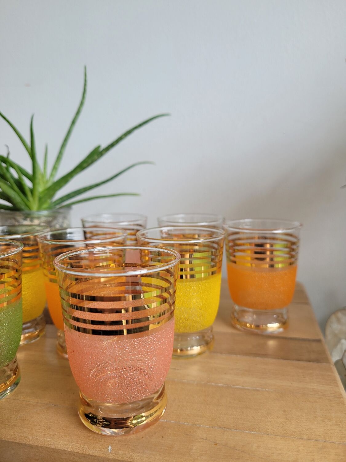 Set of 9 gilded granite glasses