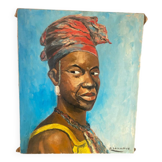 Portrait of an African woman signed