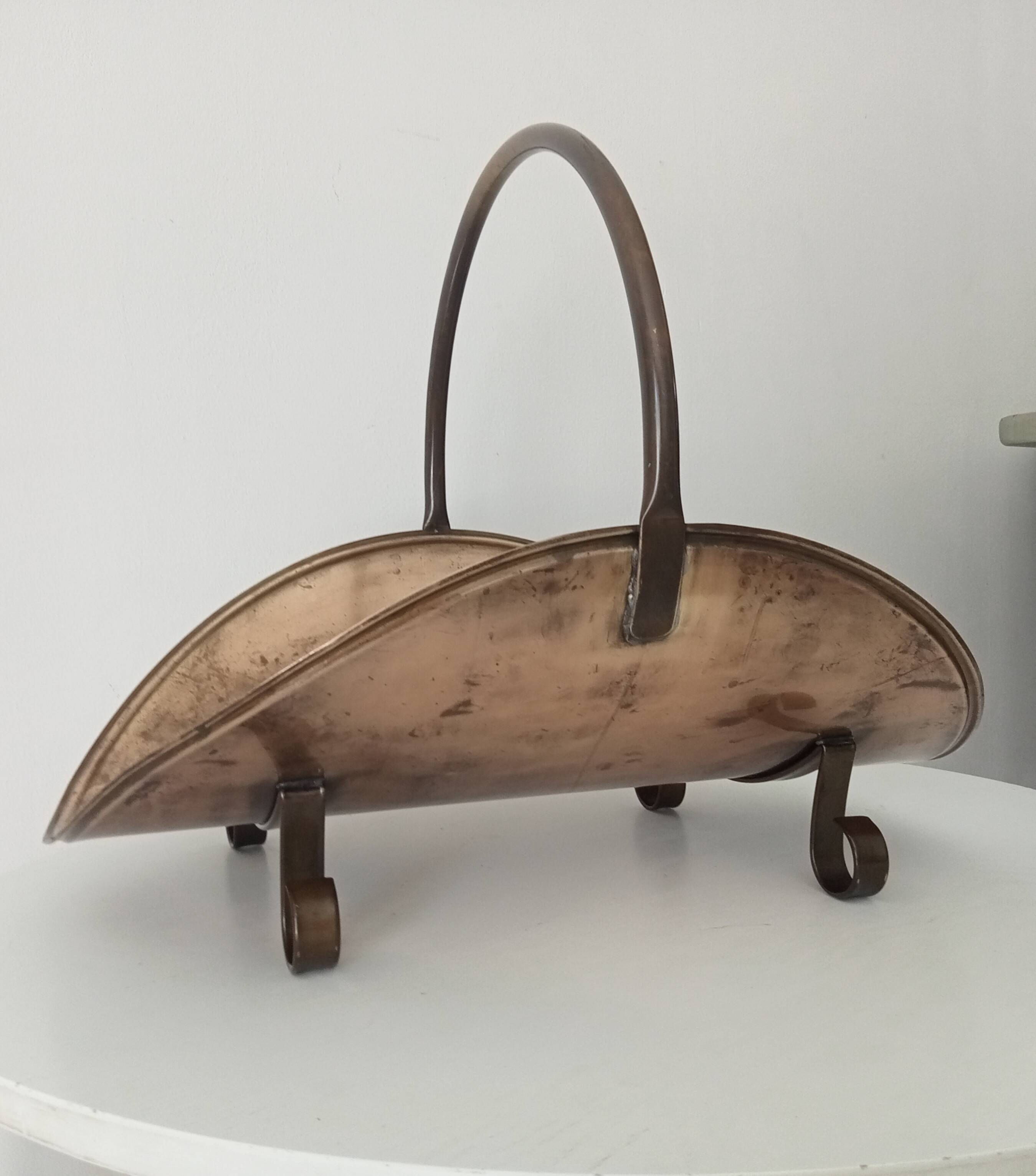 Old brass log holder