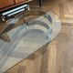 70s design oval coffee table in glass with chrome legs.