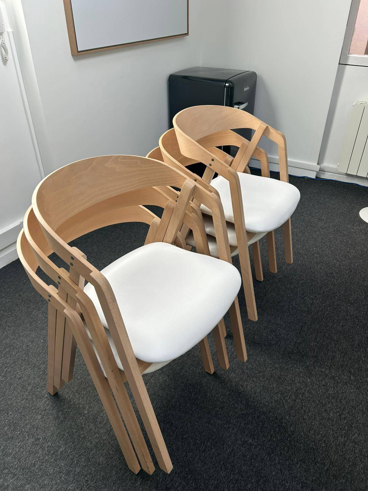 Professional chairs in beech and coated white textile