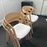 Professional chairs in beech and coated white textile