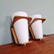 Pair of Philips teak and opaline wall lights, designed by Louis Kalff, 1950