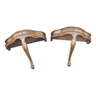 Golden patinated wall consoles