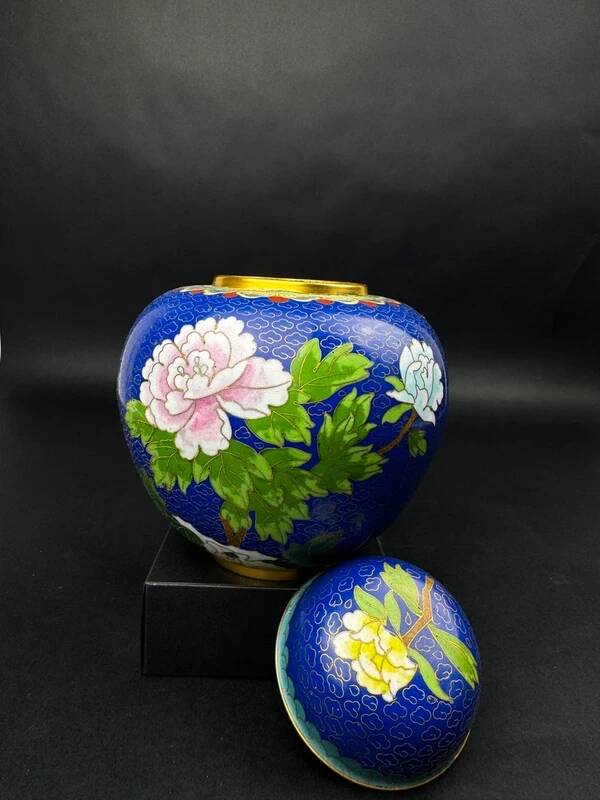 Chinese cloisonné vase decorated with peonies on a blue background, height 15 cm