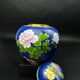 Chinese cloisonné vase decorated with peonies on a blue background, height 15 cm