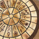 Round coffee table in ceramic and wood in the style of Roger Capron.