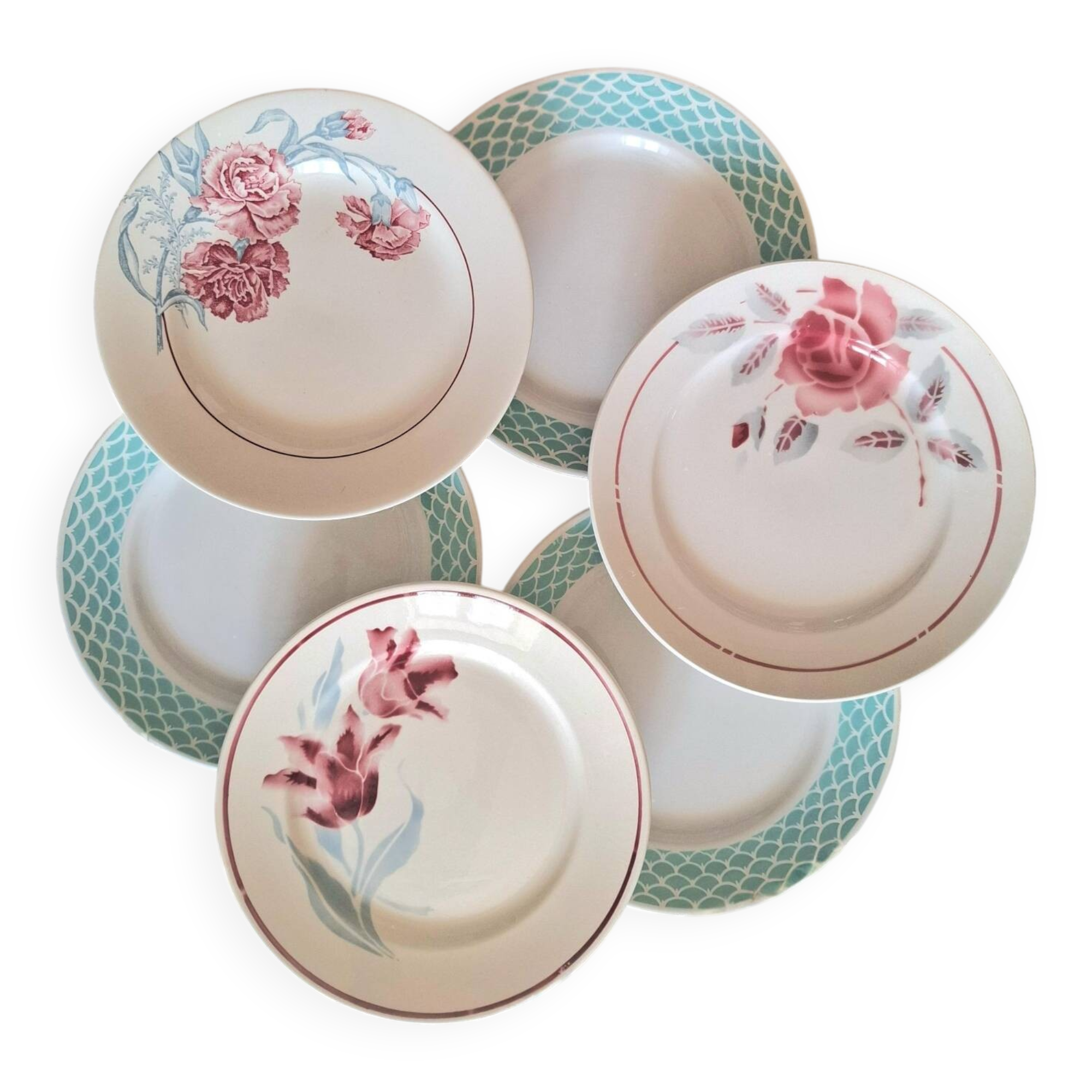 Mismatched antique flat plates in earthenware.