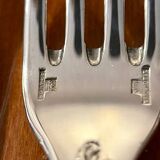 Christofle France, 12 dessert knives and 12 dessert forks in new condition.