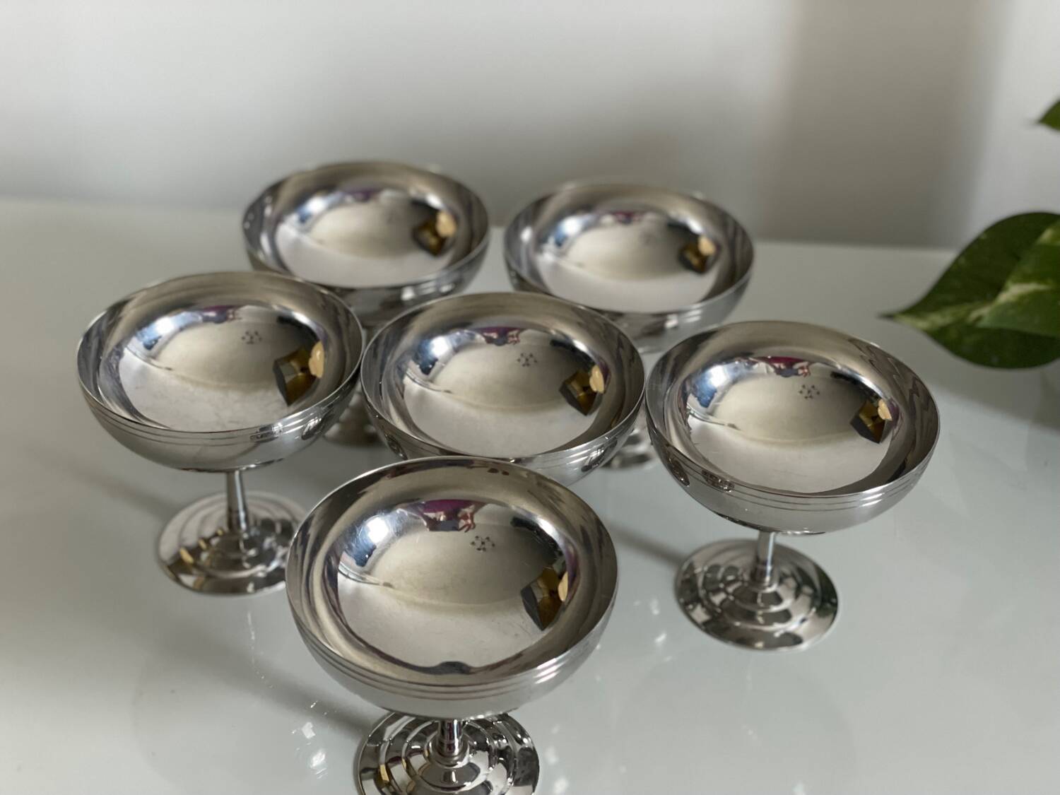 Six Guy Degrenne stainless steel ice cream cups.