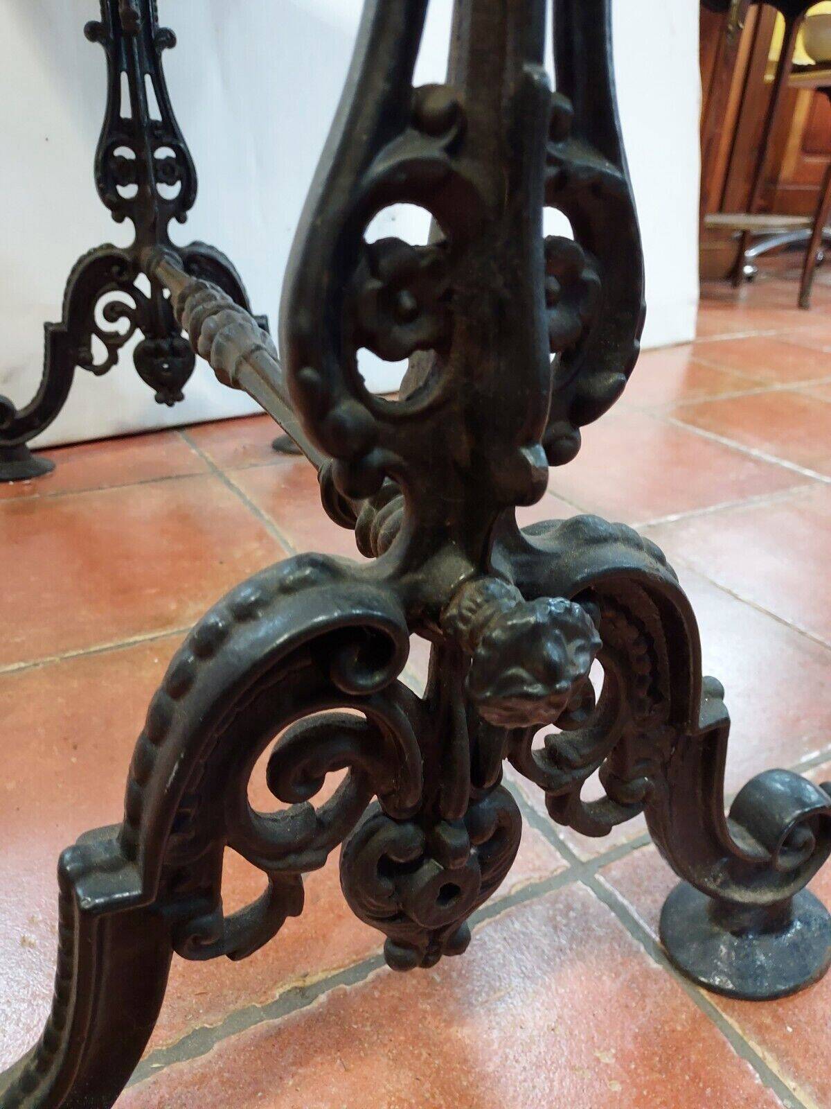 bistro table with cast iron base and marble top