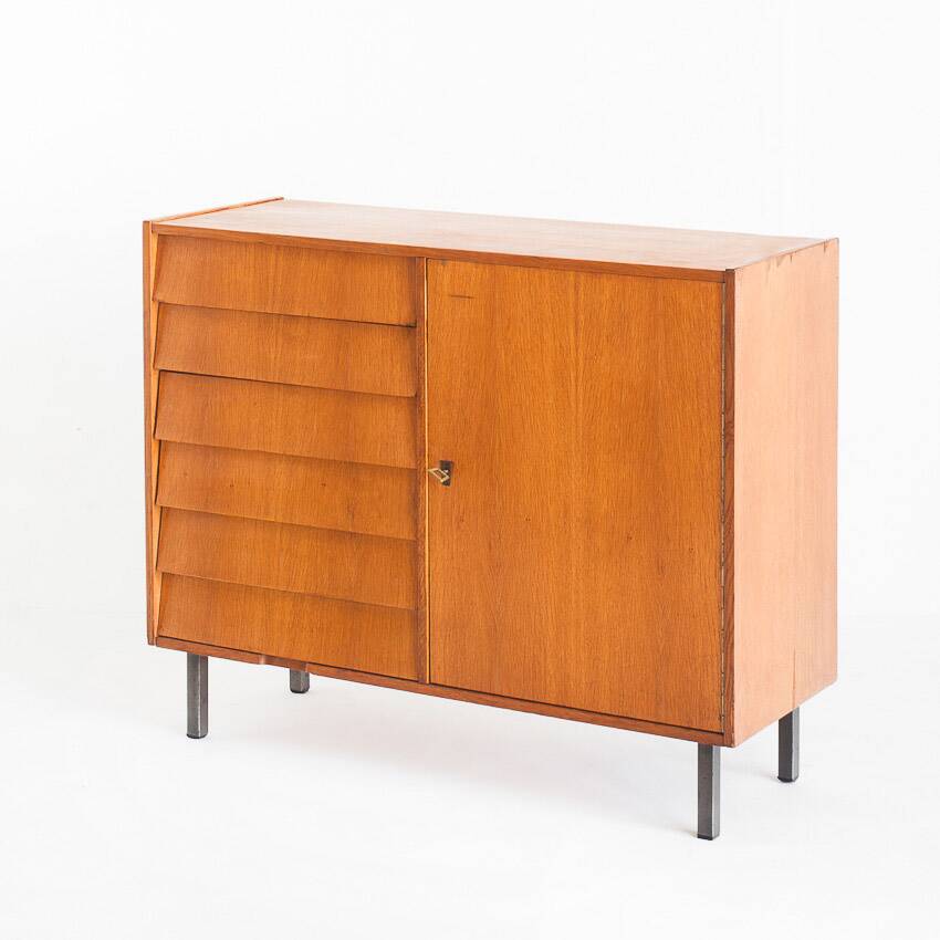 Vintage sideboard. Oak wood, drawers and door. France, 1960s