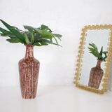 Large luminous acrylic mirror.