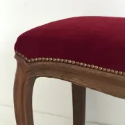 Louis XV style bench in oak and red velvet, 19th century.