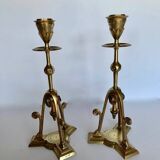Pair of bronze tripod candlesticks,