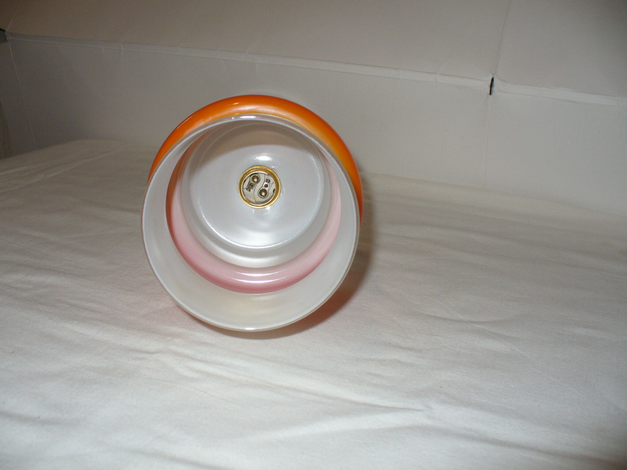 Pair of orange suspensions from the 70s