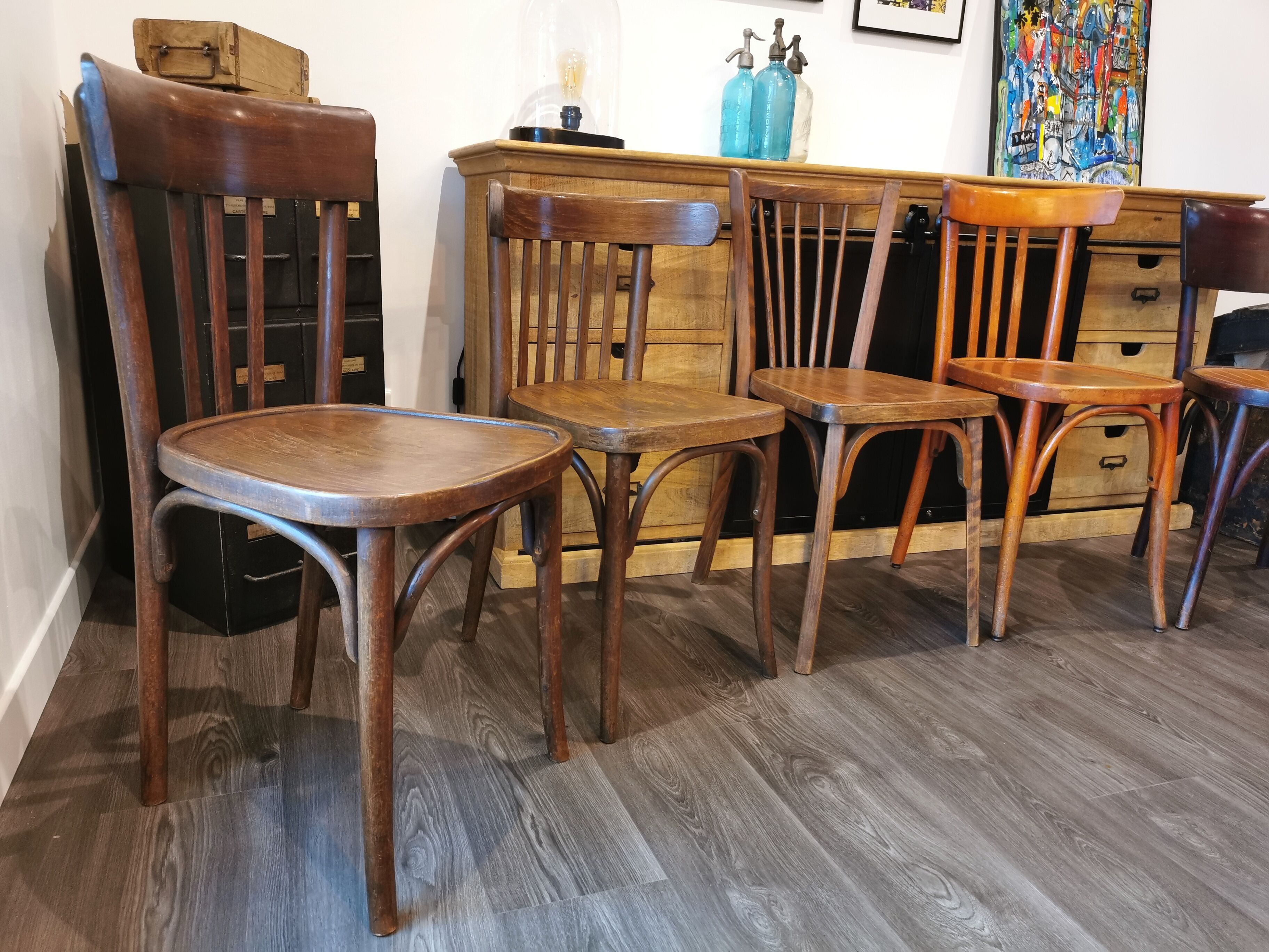 Series of 6 mismatched bistro chairs Baumann and Mahieu