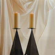 Pair of pyramid-shaped candlesticks in blackened metal (brutalism)