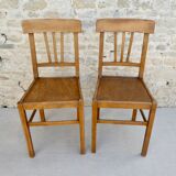 Pair of bistro chairs with perforated seat