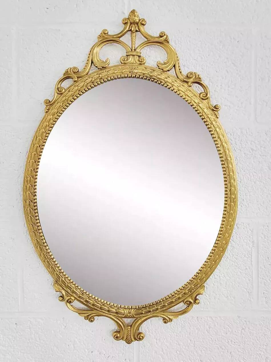 Italian oval brass medallion mirror